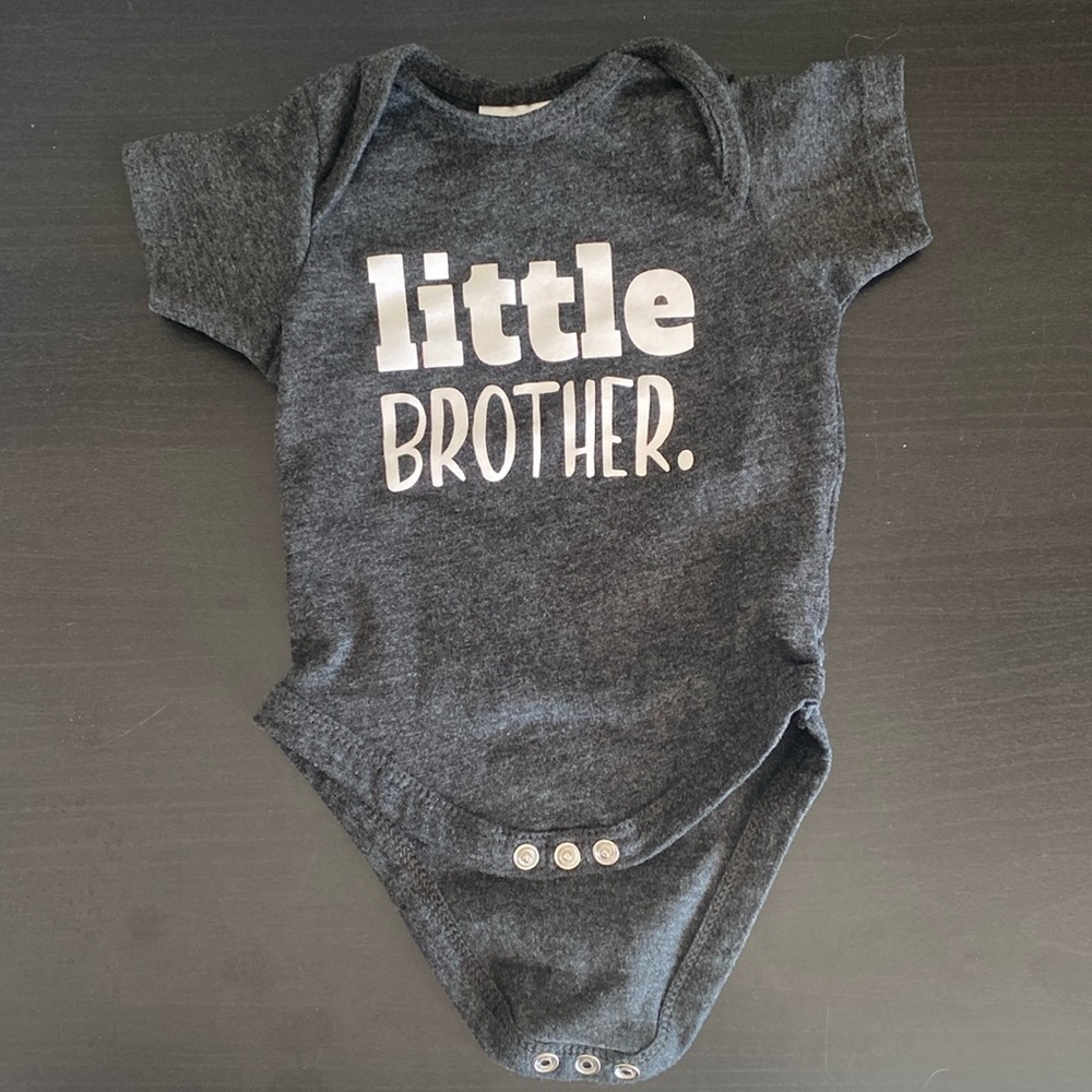 UNORDINARY TODDLER 0-3m little brother onsie